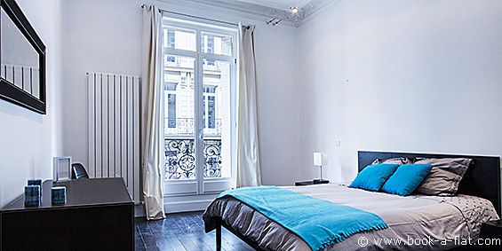 Chambre d'un appartement 3 chambres dans le 8ème arrondissement de Paris